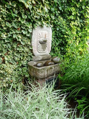 Solar pump and hose for a DIY water feature